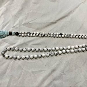 Howlite and garnet 108 bead mala